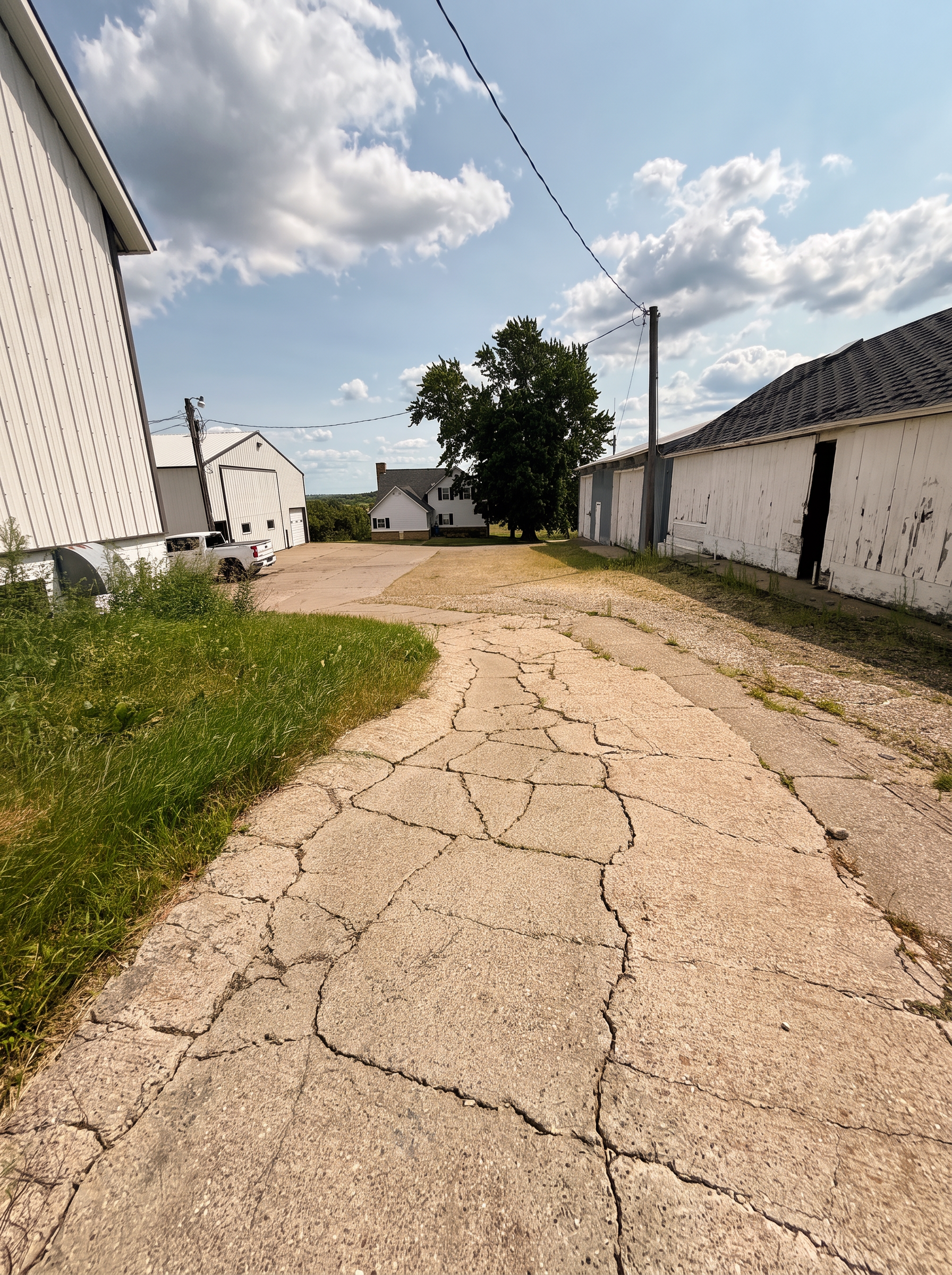 The real farm lane and buildings today